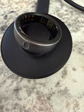 Oura Ring in Black with Gold Sensor Accents